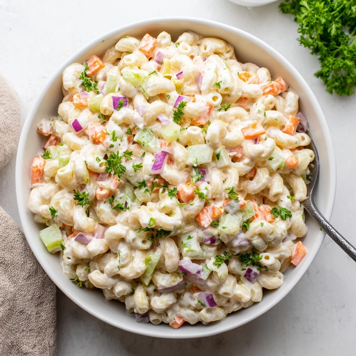 Classic Tangy And Creamy Macaroni Salad featuring tender pasta coated in tangy dressing