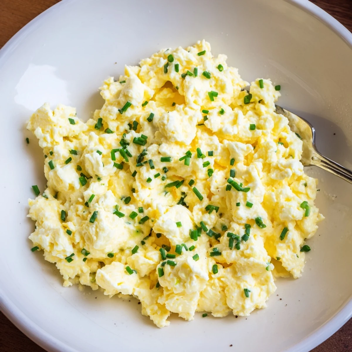Cottage Cheese Scrambled Eggs with Chives, creamy and fluffy, served on toast
