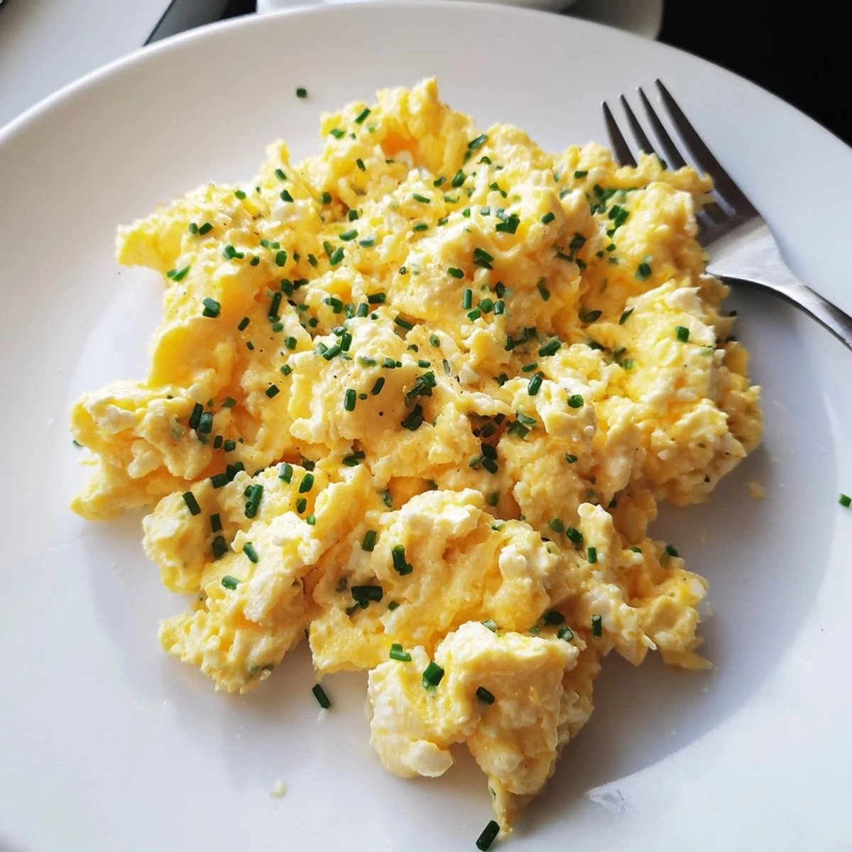 Warm Cottage Cheese Scrambled Eggs with Chives, buttery skillet texture and herb aroma